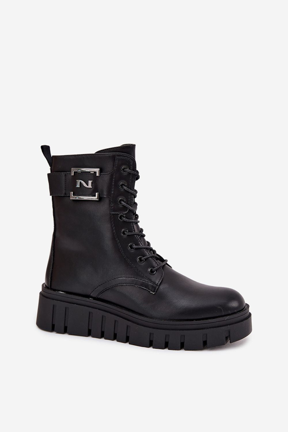 Close-up of the luxury eco leather texture on the women's ankle boots by Step in Style, showcasing the chic platform and heel design.
