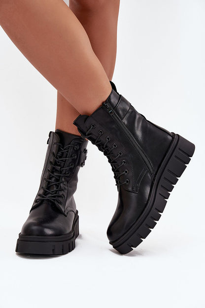 Model wearing Step in Style women's ankle boots with side zip and lace, highlighting comfort and elegance in sizes EU 36-41.