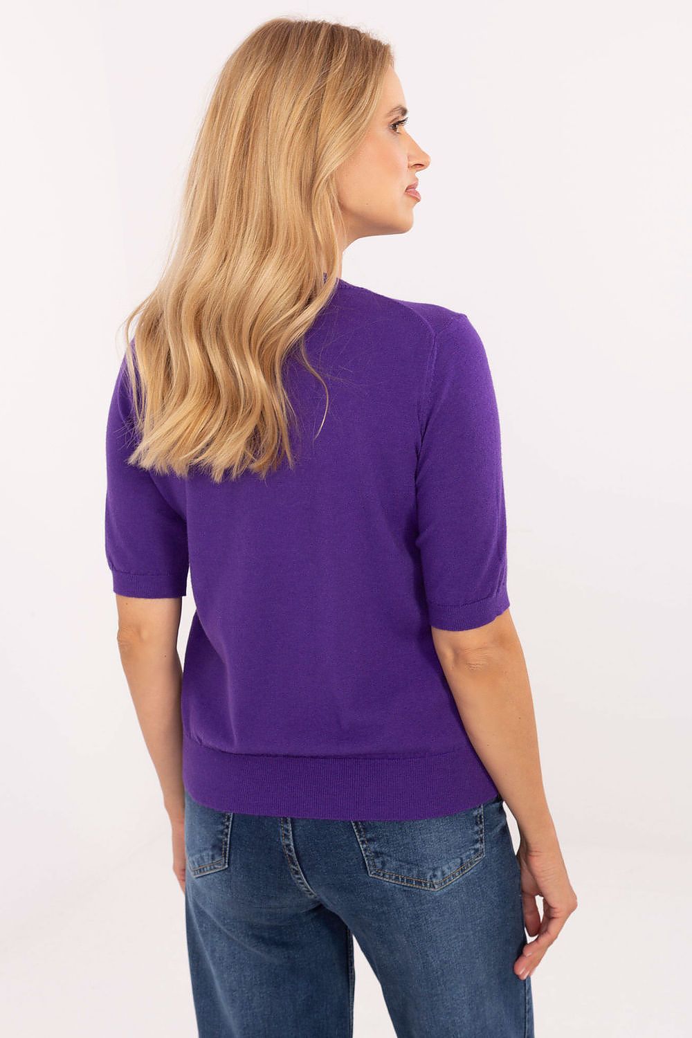Stylish Women's casual sweater displayed, showcasing its soft fabric and elegant design by Factory Price.