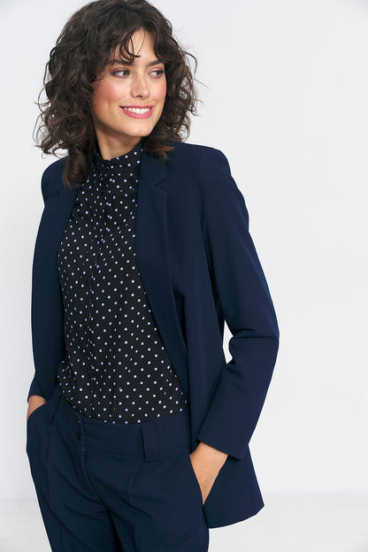 Close-up view of Nife's elegant blazer jacket, highlighting the premium fabric blend of spandex, polyester, and viscose for comfort and style.