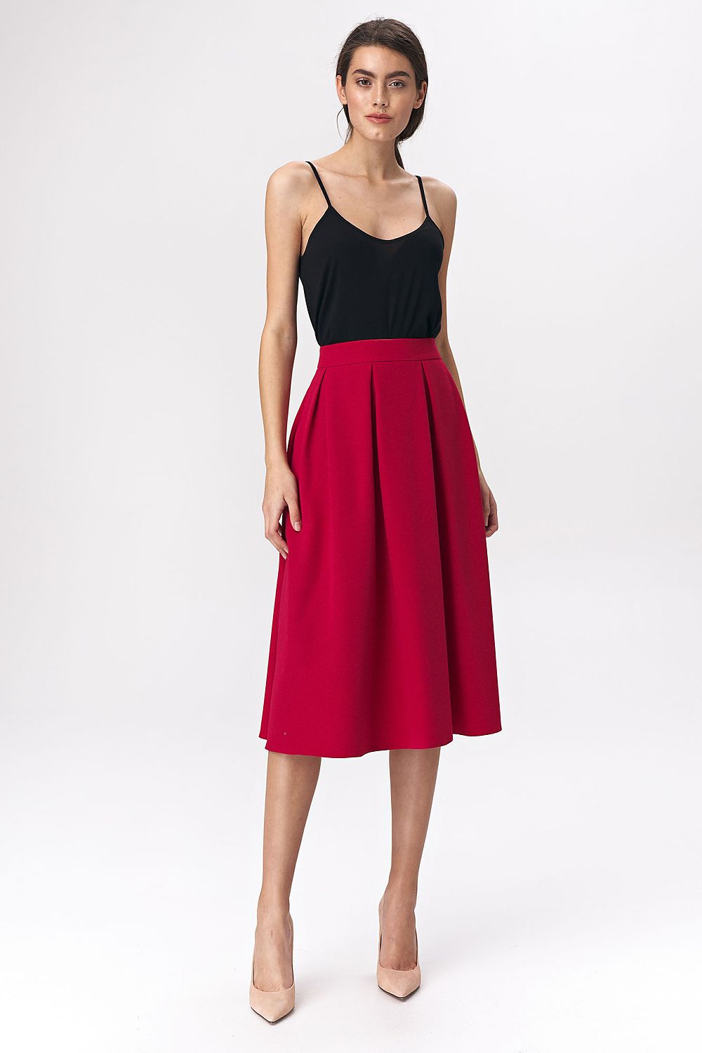 Elegant red midi skirt by Nife featuring a flared design, crafted from a soft viscose blend, perfect for high-end office and casual wear.