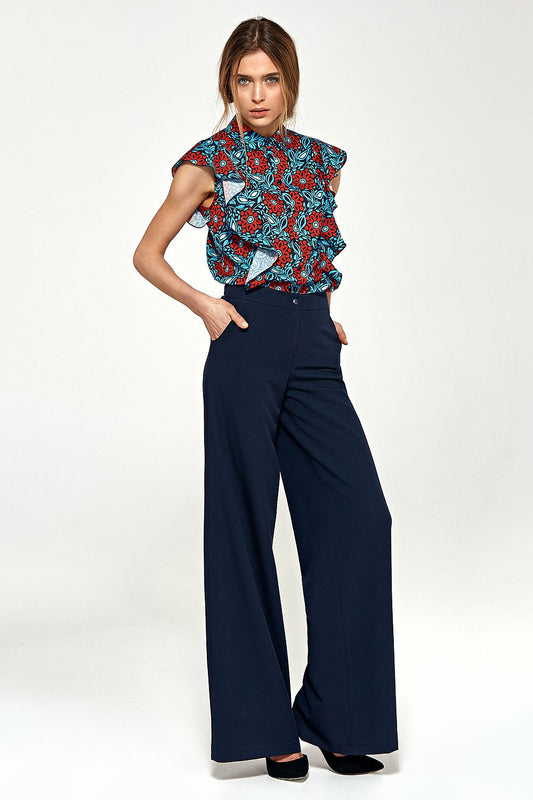 Elegant Nife navy blue palazzo pants featuring flared legs and practical pockets, perfect for a luxurious wardrobe upgrade.