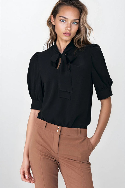 Elegant Nife blouse with neck tie and puffy sleeves, showcasing luxurious 100% viscose fabric, perfect for soft-office stylings.