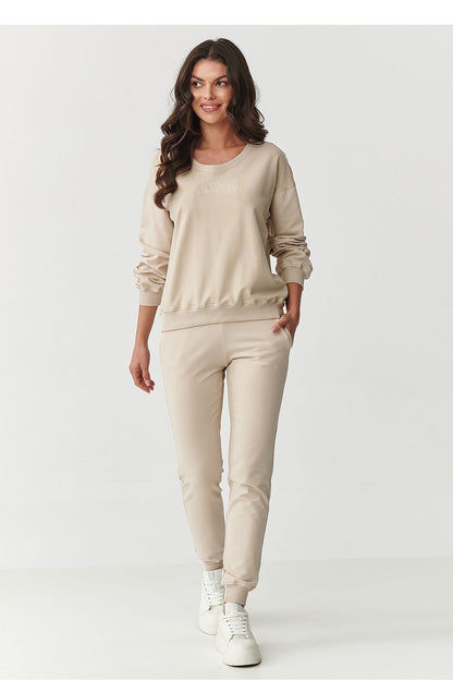 Elegant Makadamia Women's Cotton Blend Tracksuit Set displayed, emphasizing its premium fabric and contemporary style for sophisticated leisurewear.