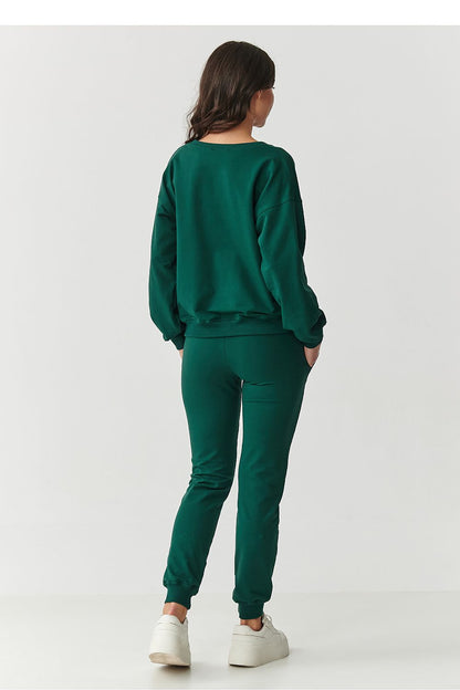 Fashionable Makadamia relaxed fit tracksuit set showcasing minimalist design, ideal for both casual home wear and stylish outings.