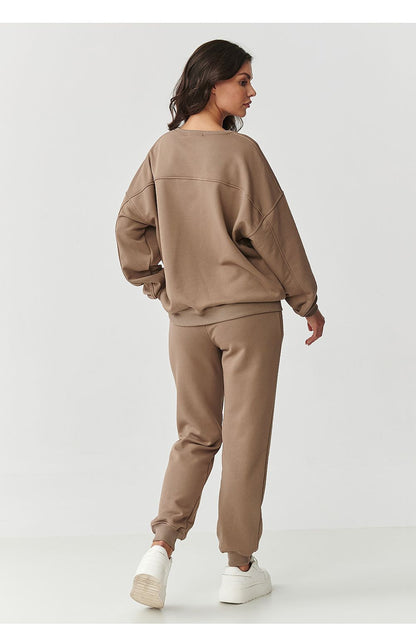 Luxury women's cotton tracksuit set by Makadamia featuring an embroidered logo, ideal for stylish comfort.