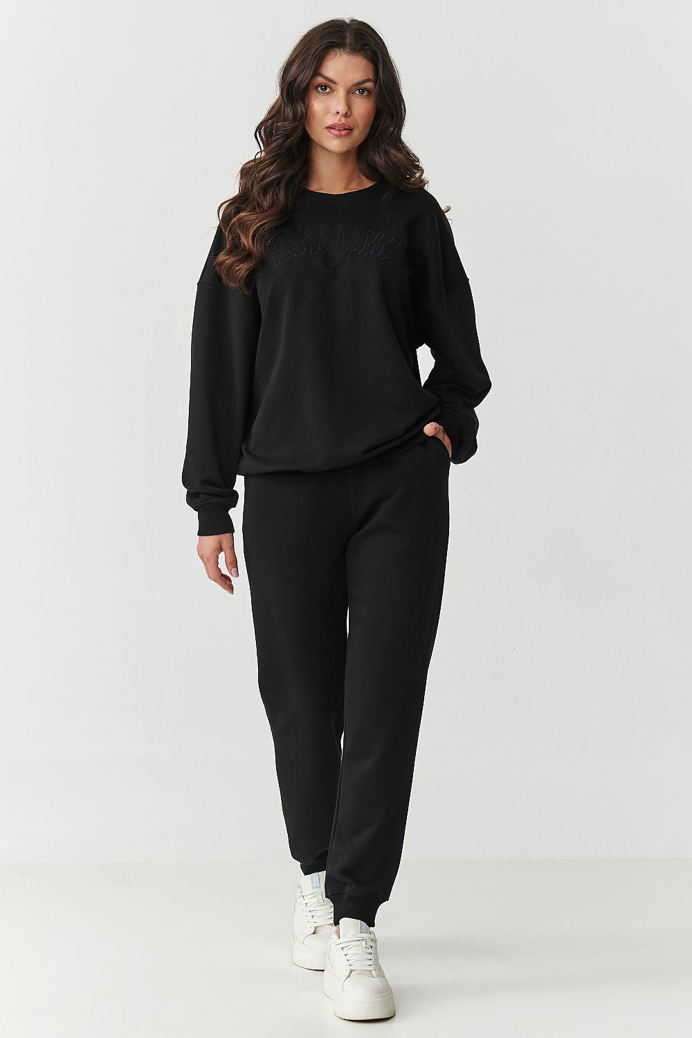 Luxury women's cotton tracksuit set by Makadamia featuring an embroidered logo, showcasing a stylish design perfect for casual wear.