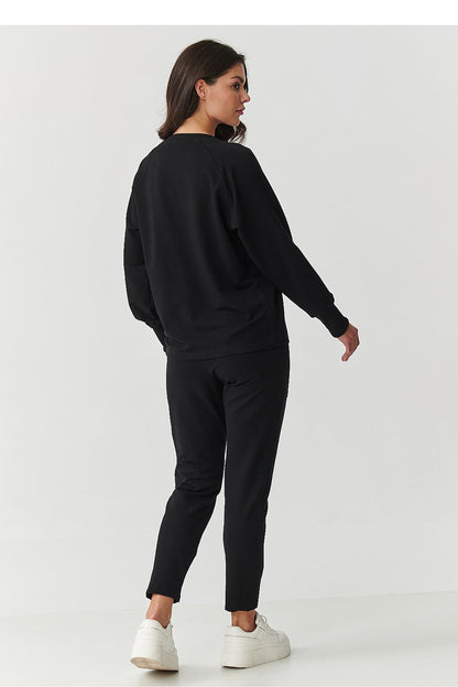 Complete Makadamia women's tracksuit set displayed in elegant style, featuring high-quality cotton and elastane blend, perfect for relaxed yet chic wear.