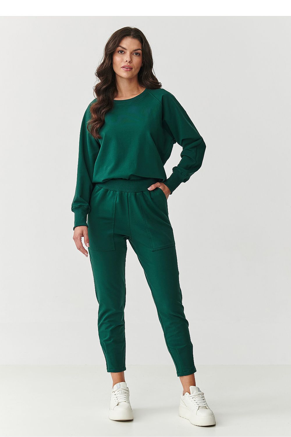 Luxury women's Makadamia tracksuit set in a comfortable cotton blend, perfect for stylish casual wear.