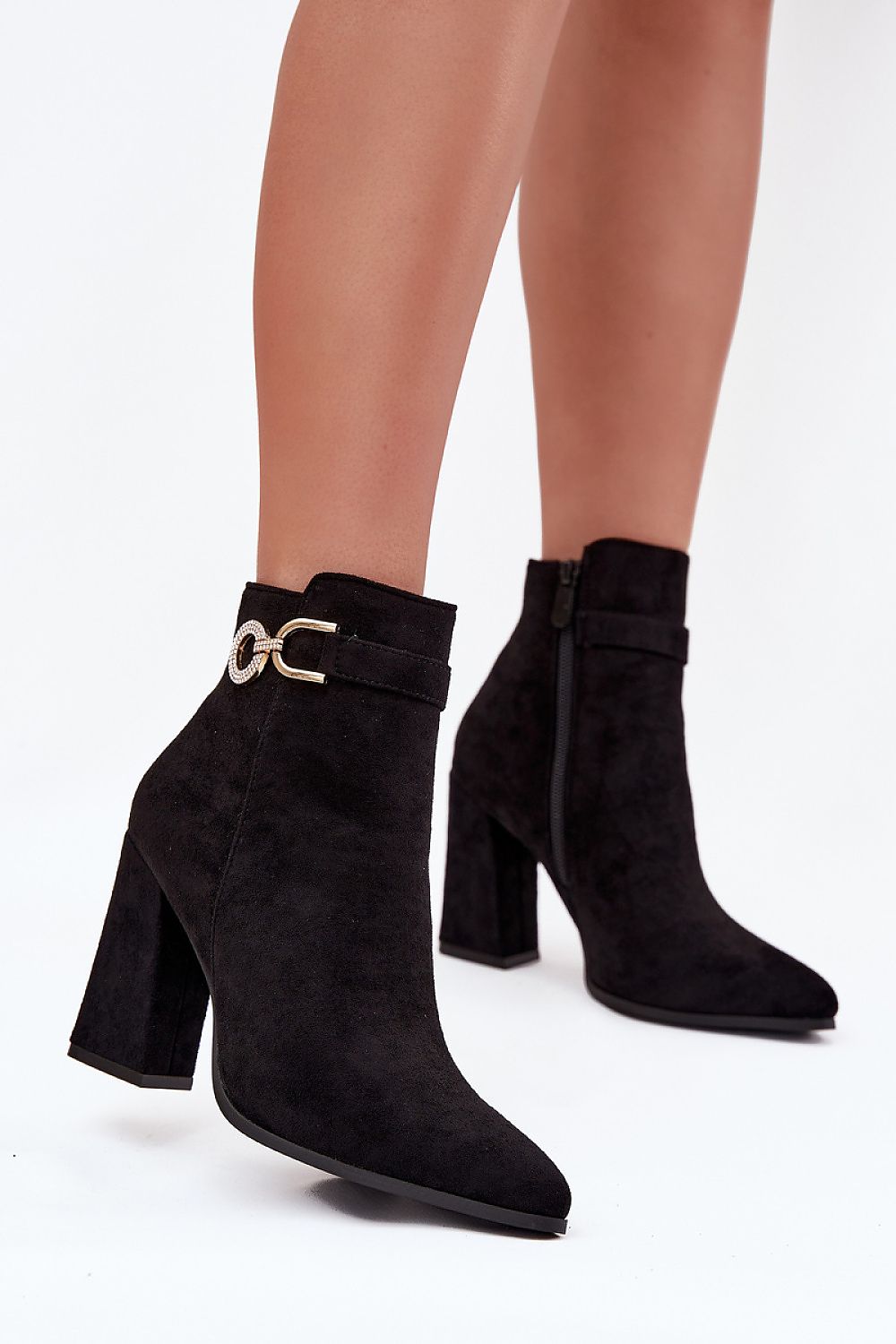 Luxury eco-leather women's ankle boots by Step in Style with a 9.5cm heel, featuring a pointed toe and decorative strap, perfect for elegant style in sizes EU 36-41.