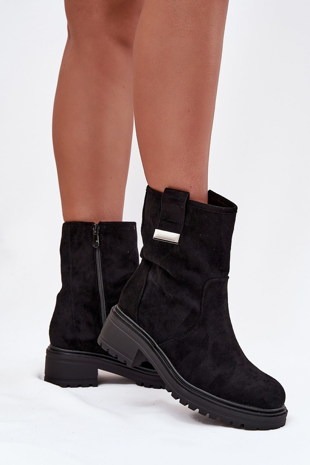 Sophisticated ankle boots for women from Step in Style, made with luxurious faux suede, showcasing a practical zipper and comfortable design, available in sizes EU 36-41.