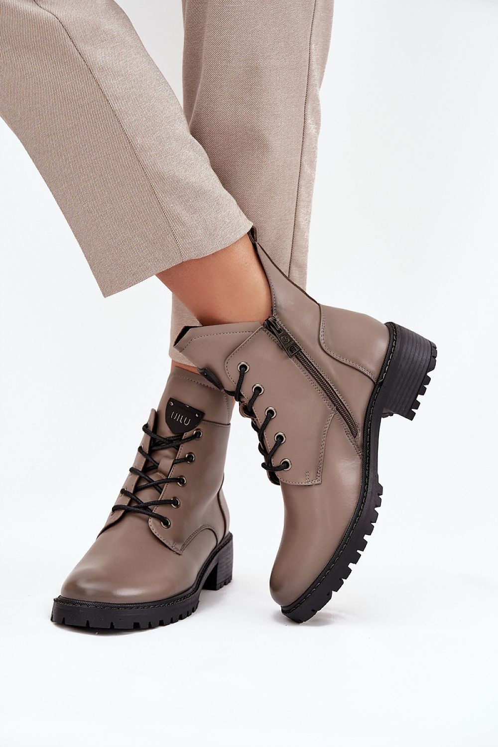 Luxury Vinceza women's ankle boots featuring a stylish block heel, ideal for elegance and comfort. Designed with both lacing and a zipper for a perfect fit, these artificial leather boots are perfect for sophisticated outfits. Sizes available EU 36-41.
