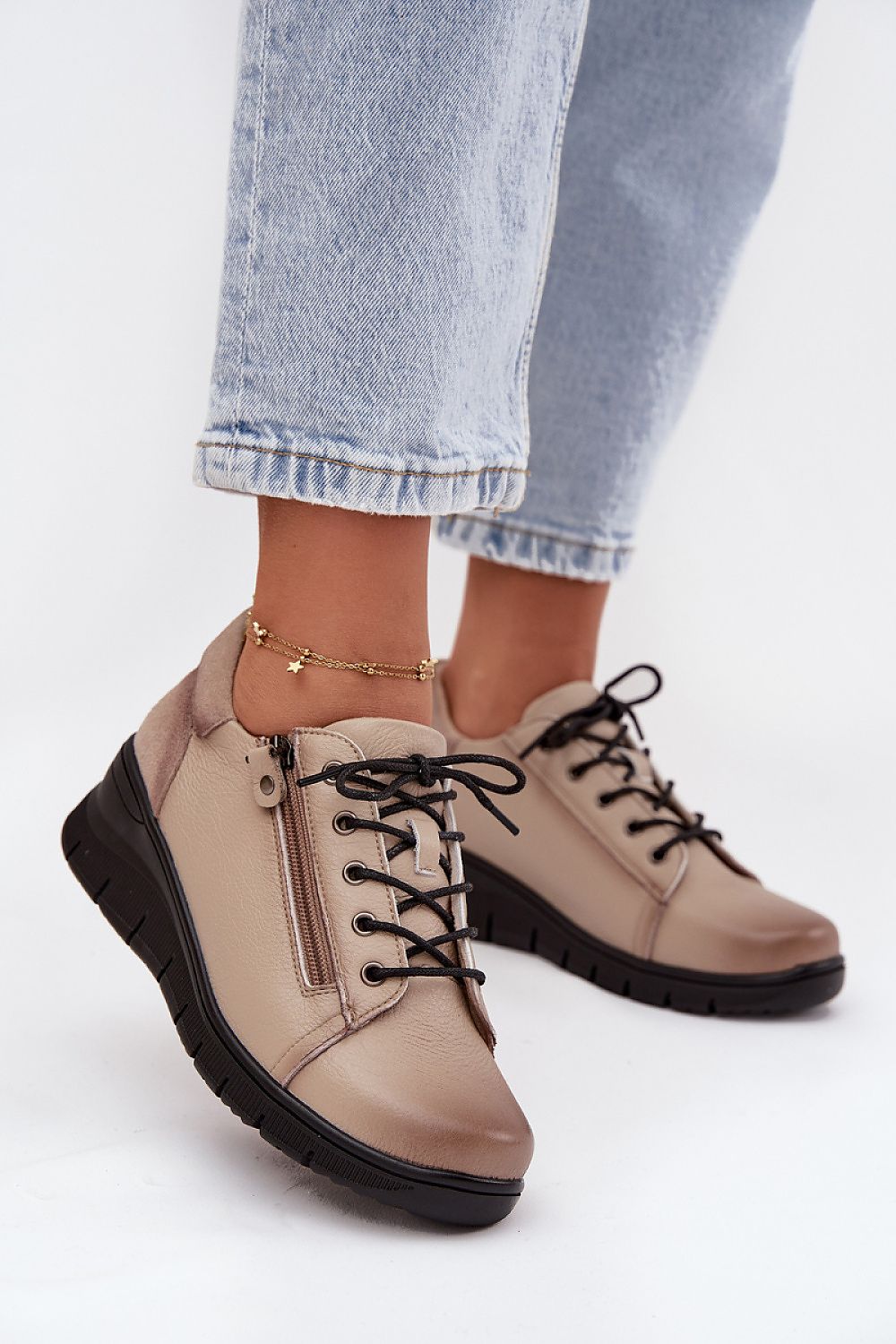 Close-up of Vinceza natural leather half shoes showcasing the premium quality and chic design with side zip detail.