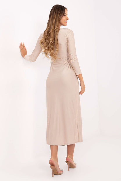 Model wearing Italy Moda's luxurious midi evening dress in a graceful pose, highlighting its minimalist and feminine charm.