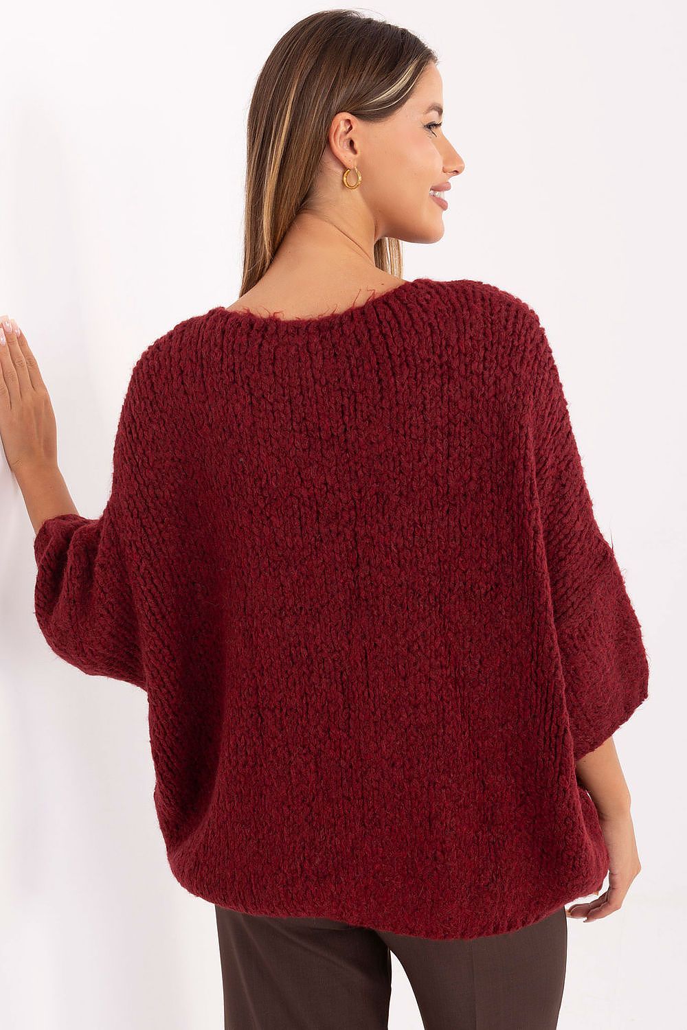 Elegant women's oversized V-neck sweater in an alpaca blend, designed by Italy Moda for sophisticated everyday wear.