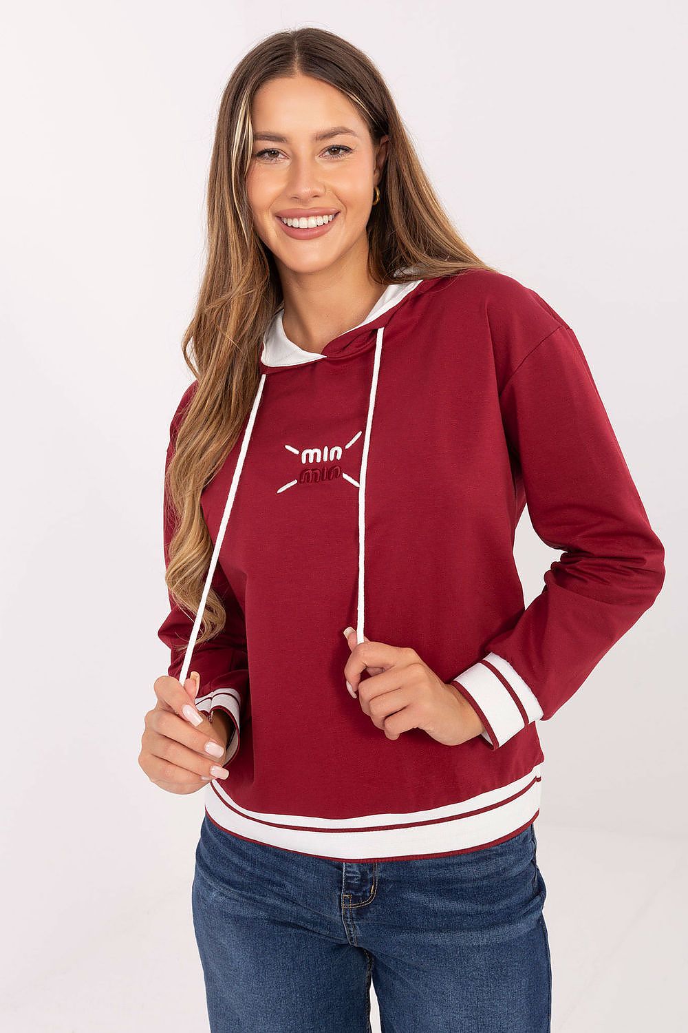 Fashionable women's casual sweatshirt with modern embroidery and a hood, available from Relevance in premium quality cotton-blend.