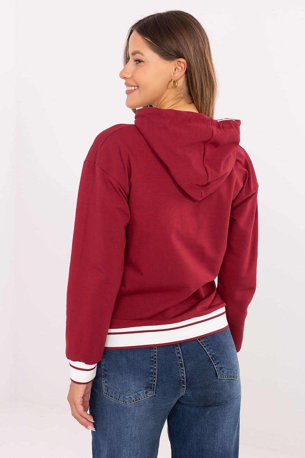 Elegant side view of Luxury Women's Cotton-Blend Sweatshirt with Embroidery by Relevance, highlighting the practical hood and relaxed fit.