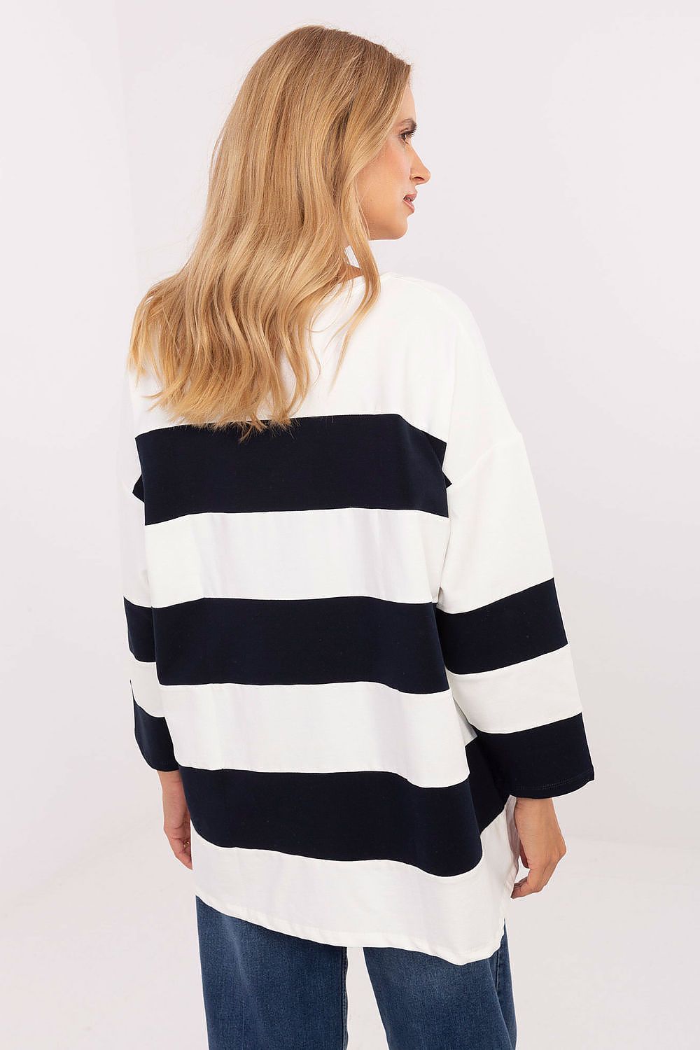 Luxury oversized striped sweatshirt for women from Relevance, crafted from a soft cotton blend for ultimate comfort, featuring a timeless striped pattern for a fresh, casual look.