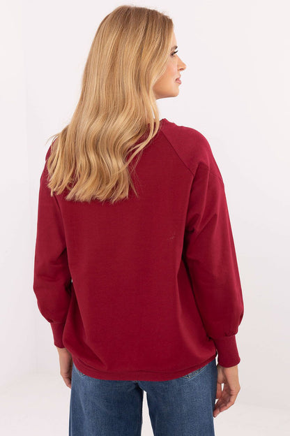 Chic women's blouse in cotton blend with fashionable studs and adjustable tie by Relevance, showcasing a classic round neckline and long sleeves for a classy look.