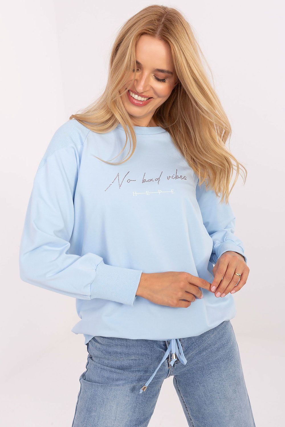 Versatile women's casual blouse by Relevance, crafted from a comfortable cotton and spandex blend, adorned with stylish studs and an adjustable tie for a flattering fit.