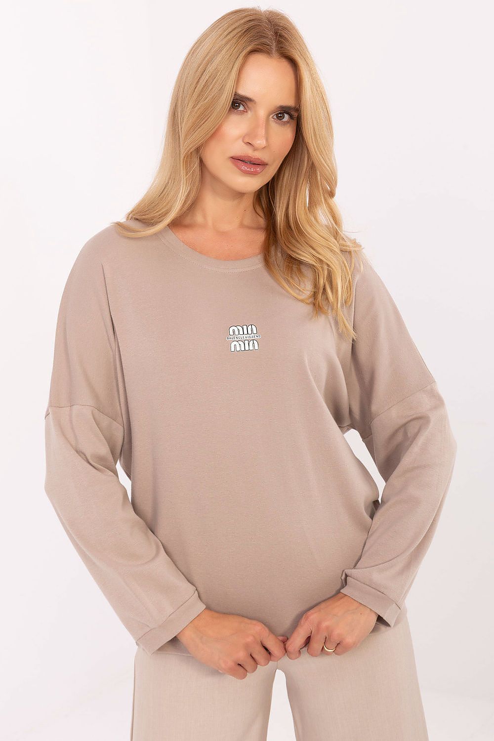 Close-up detail of the luxury cotton blend blouse for women by Relevance, highlighting the premium fabric and elegant fit.