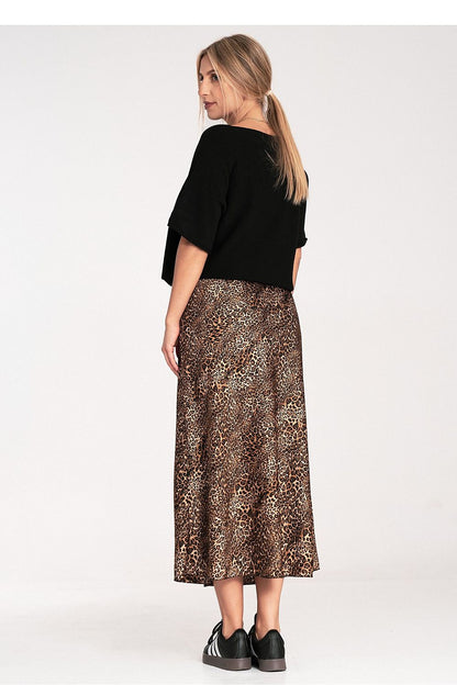 Model wearing the Figl Bat Style Blouse in a chic setting, highlighting its elegant silhouette and versatile fashion appeal.