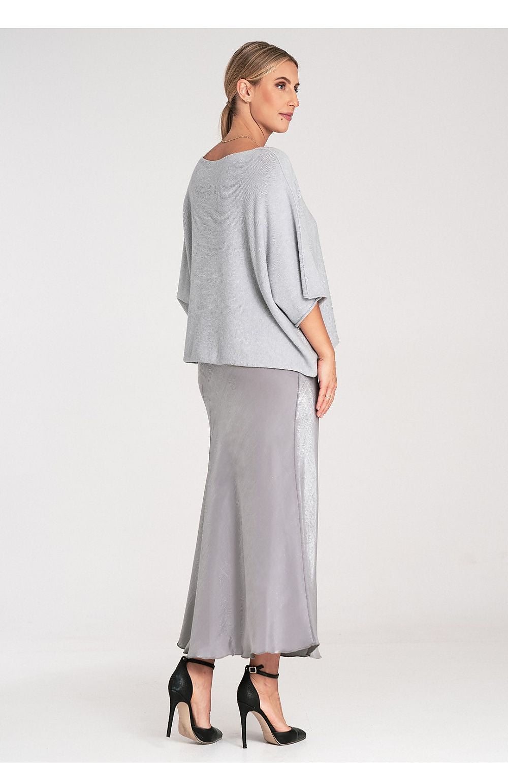 Detailed view of the Figl Bat Style Blouse with a focus on its elegant cut and luxurious texture.