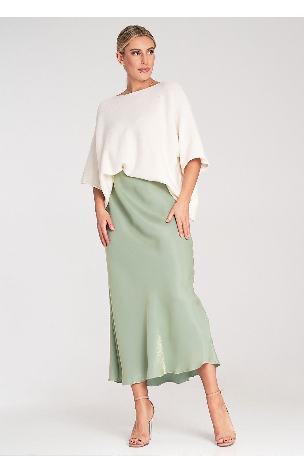 Close-up view of the Figl Bat Style Blouse, highlighting the blend of acrylic, viscose, and wool materials for a premium feel.