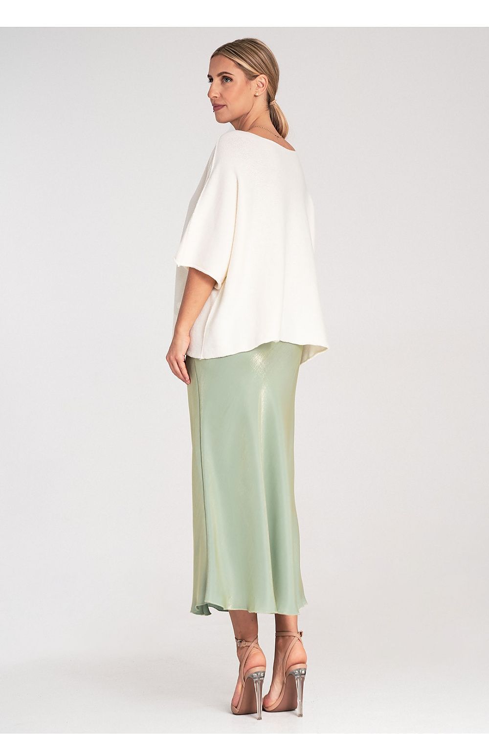 A model wearing the Figl Bat Style Blouse, elegantly styled and tailored for a chic look in sizes EU 0 to 4.