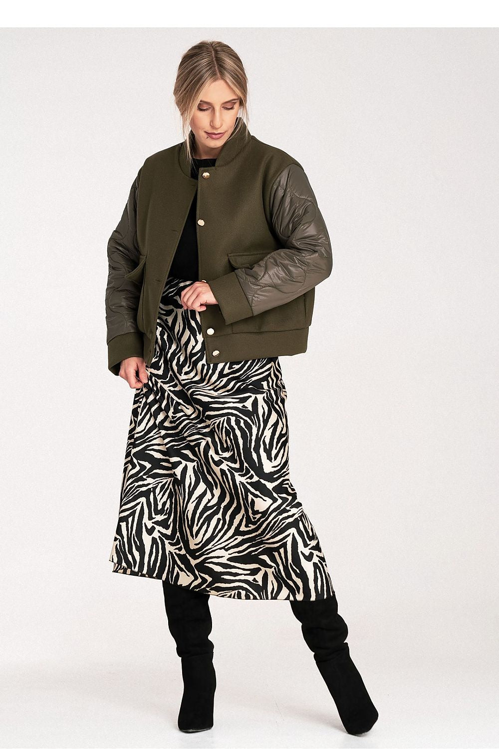 Elegant Figl Jacket styled with accessories, perfect for upscale occasions, showcasing its luxurious fabric blend and sophisticated silhouette.