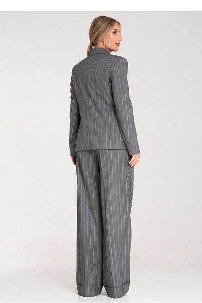 Back view of the Figl jacket, emphasising its sleek design and luxurious fabric drape.