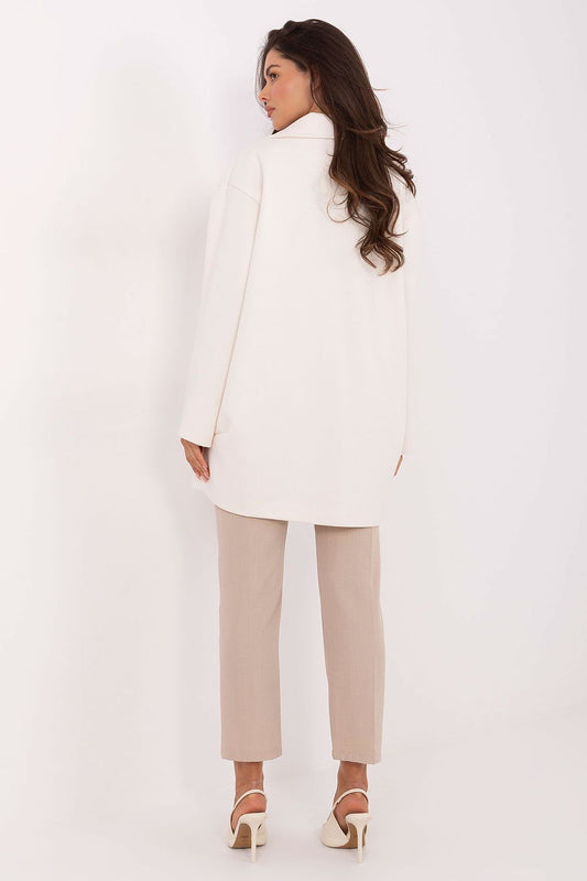 Close-up view of Rue Paris luxury coat made of 100% polyester, epitomising style and comfort for fashion-forward individuals.