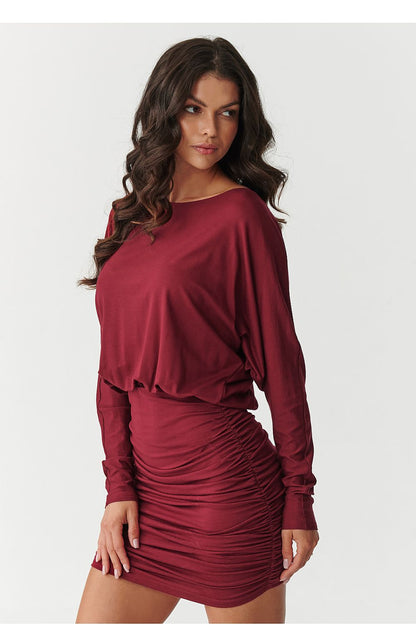 Sophisticated Makadamia dress featuring a seamless design in soft viscose and spandex, ideal for sizes EU 36 to EU 40.