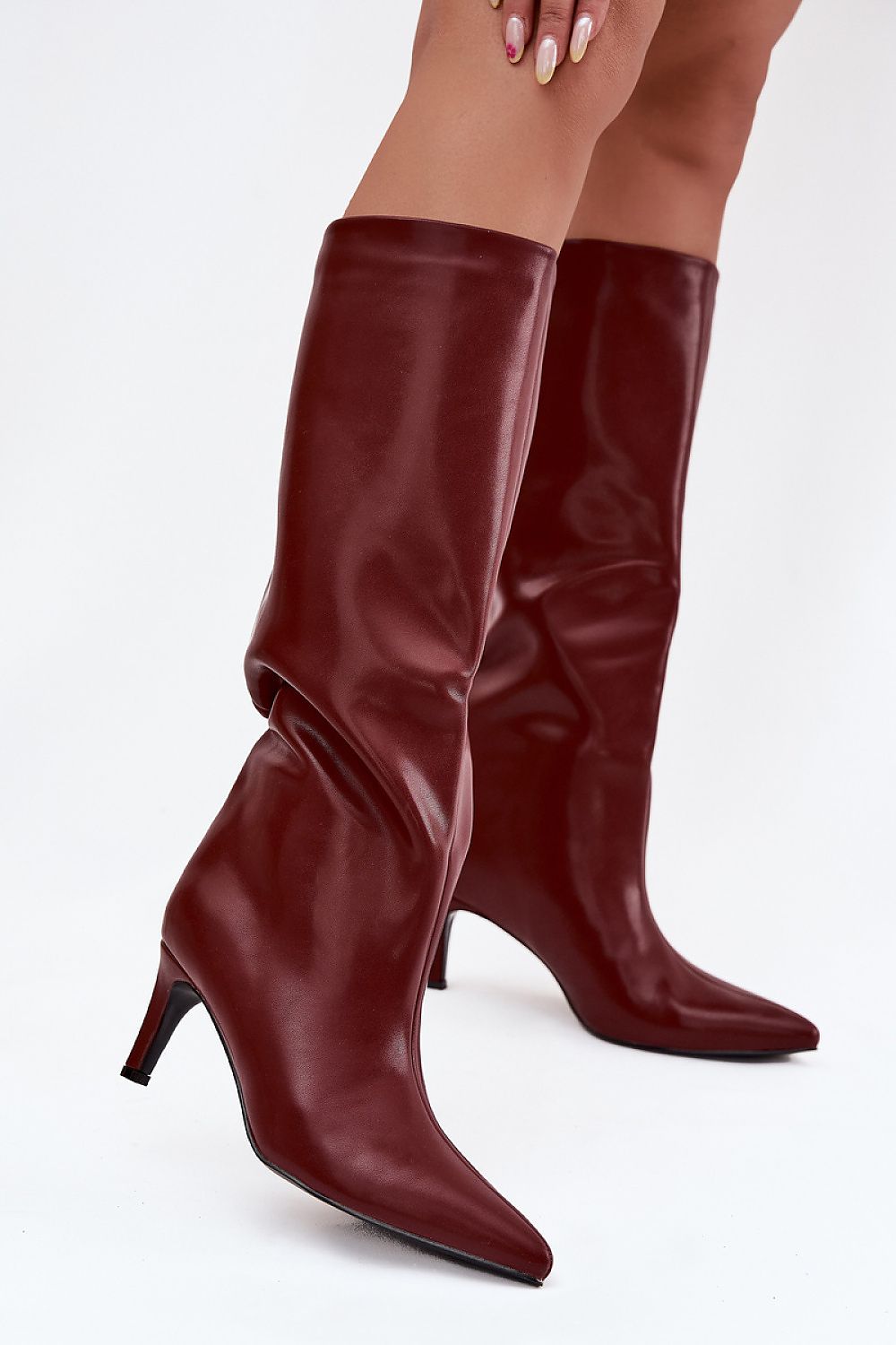 Close-up view of Step in Style's Luxury Heel Boots made of premium artificial leather, ideal for stylish outings.
