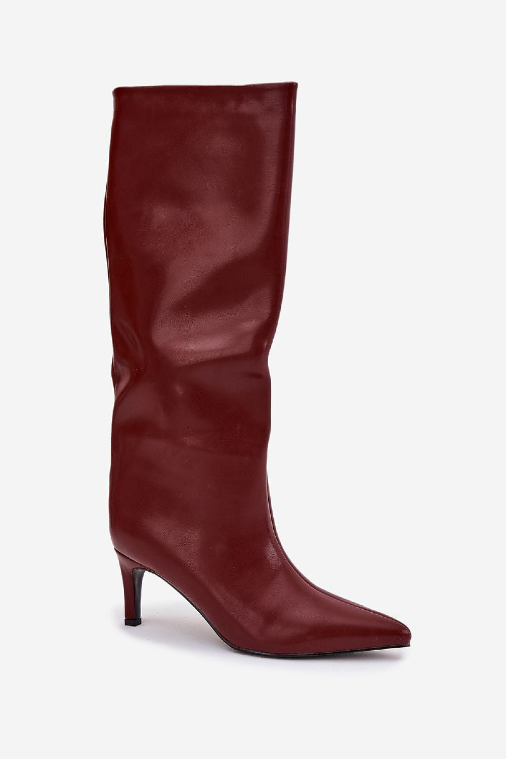 Step in Style's Luxury Heel Boots displayed against a chic backdrop, highlighting their sophisticated 38 cm upper height.