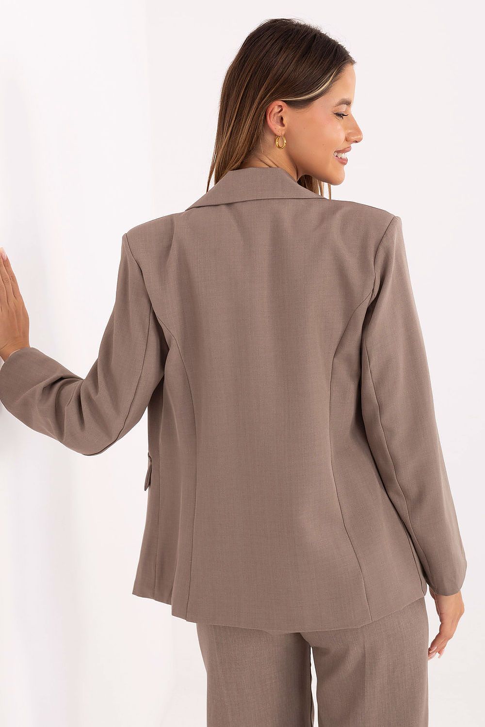 Back view of Rue Paris Luxury Jacket, illustrating the sleek design and elegant texture of the spandex and polyester blend.