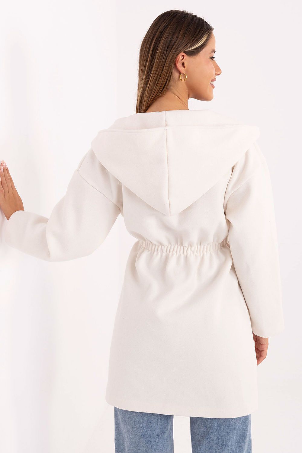 Model wearing an elegant Rue Paris coat, demonstrating versatility for upscale occasions.