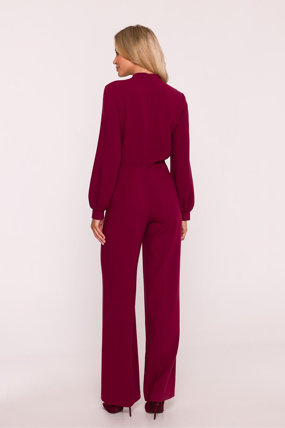 Elegant classic jumpsuit by Stylove featuring ruffle detail, fitted top, and sophisticated stand-up collar, designed for luxury style in sizes S to XXL.