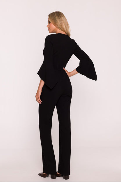 Beautifully fitted Stylove women's jumpsuit with a slender silhouette, complementing the feminine figure with an elegant belt and ruffled sleeves.