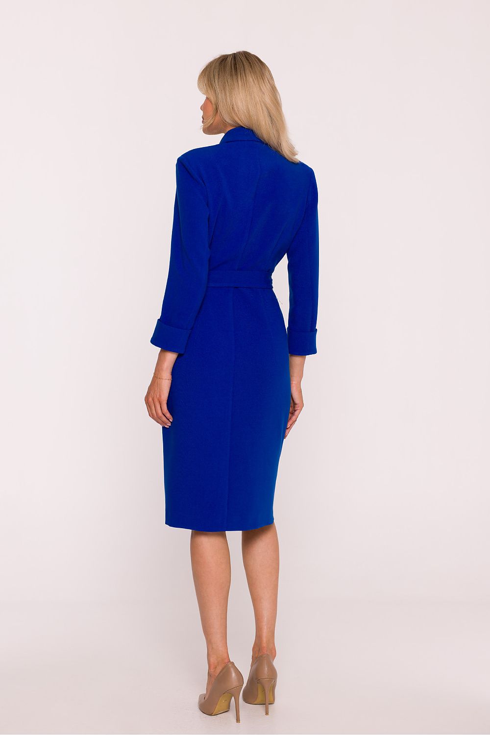 Model wearing Stylove's sophisticated wrap-around daydress, perfect for both formal occasions and casual outings, exuding elegance.