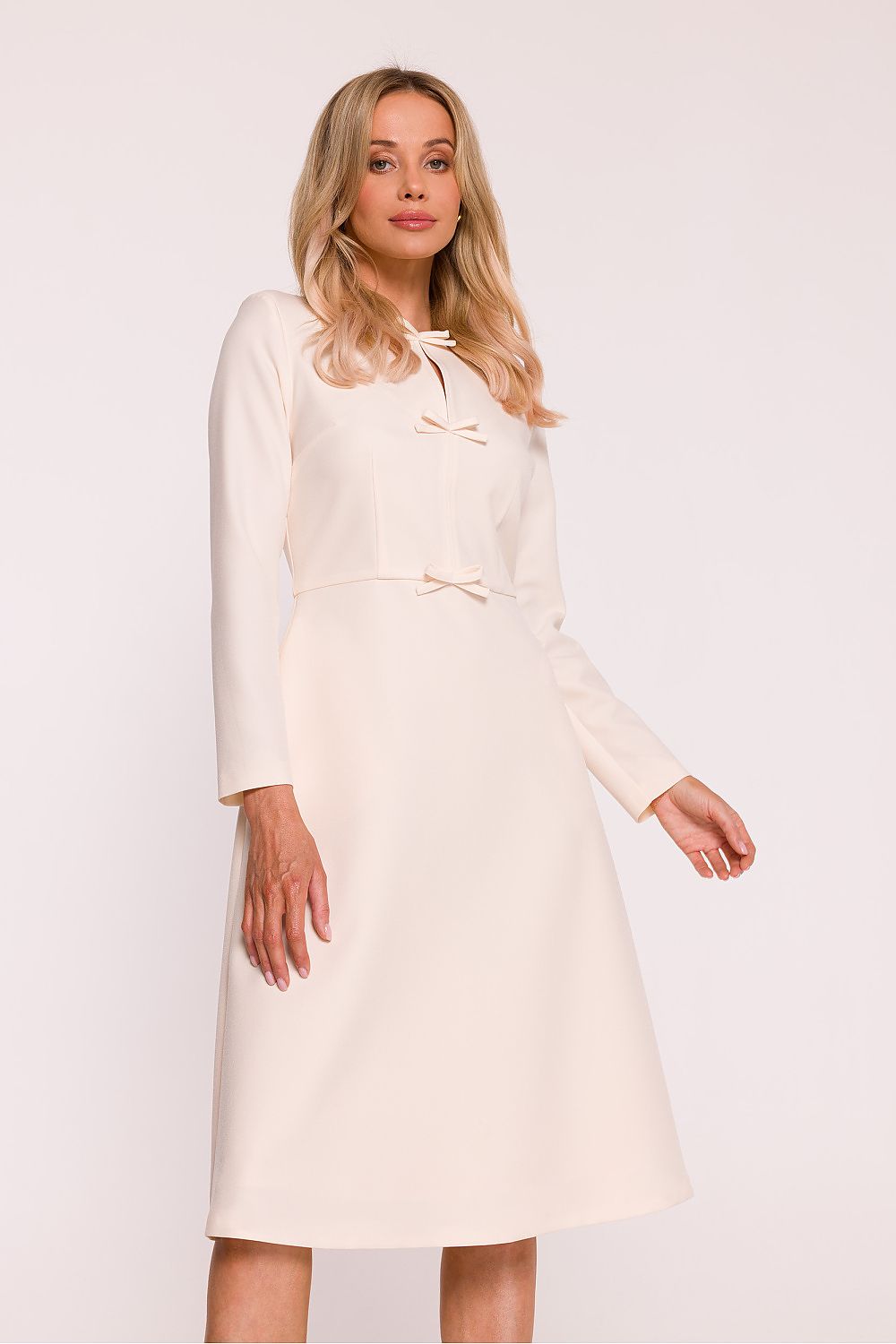Stylove Elegant Daydress featuring a semi-circular neckline and decorative bows, designed for luxurious comfort in sizes S to XXL.
