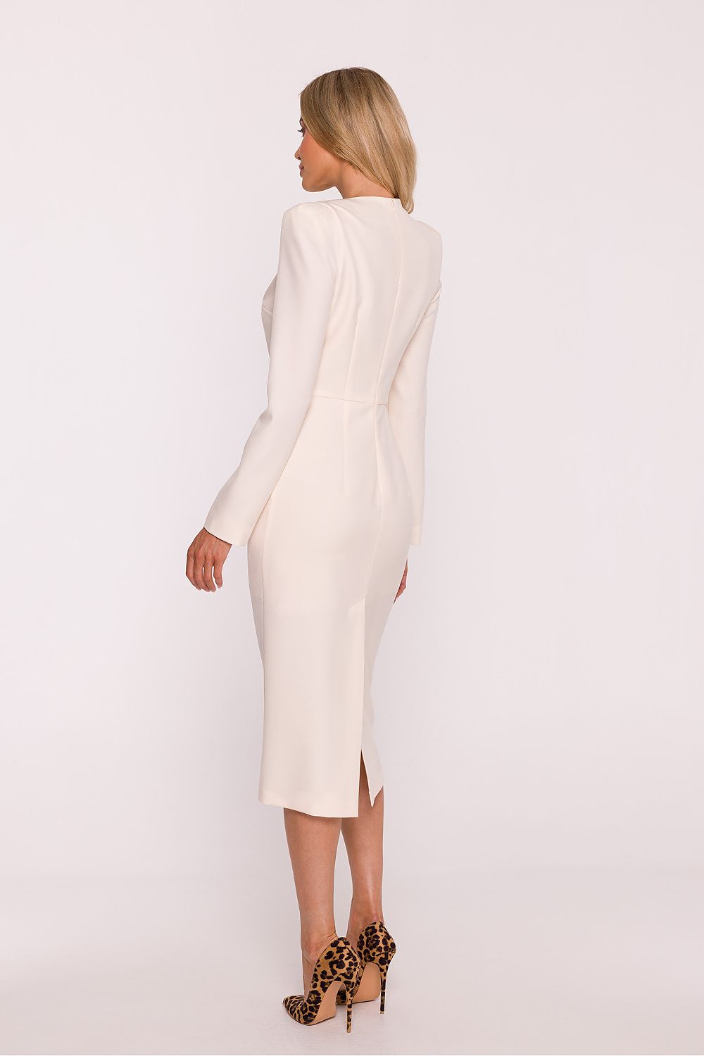 Detailed view of the Stylove Pencil Dress's smooth fabric and fitted silhouette, highlighting its contemporary elegance.