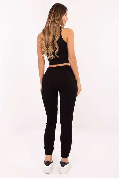 Relevance luxury cotton elastane sweatpants featuring side pockets and tapered legs, perfect for stylish casual wear.