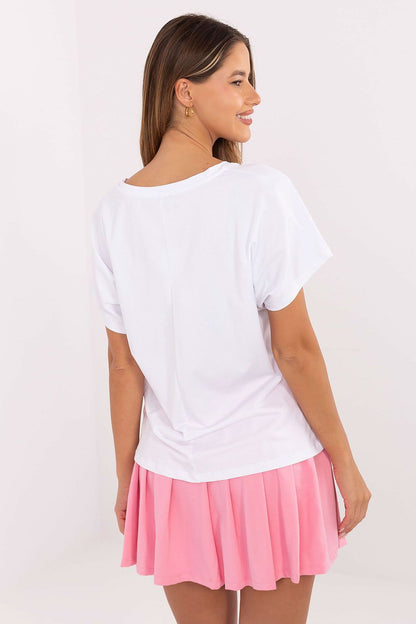 Fashionable Relevance women's casual set showcasing a modern V-neck T-shirt paired with a pleated mini skirt, designed for comfort and elegance.