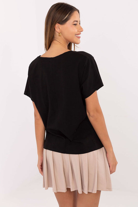 Stylish pleated mini skirt with sewn-in shorts and a high waist, part of the elegant set for women by Relevance.