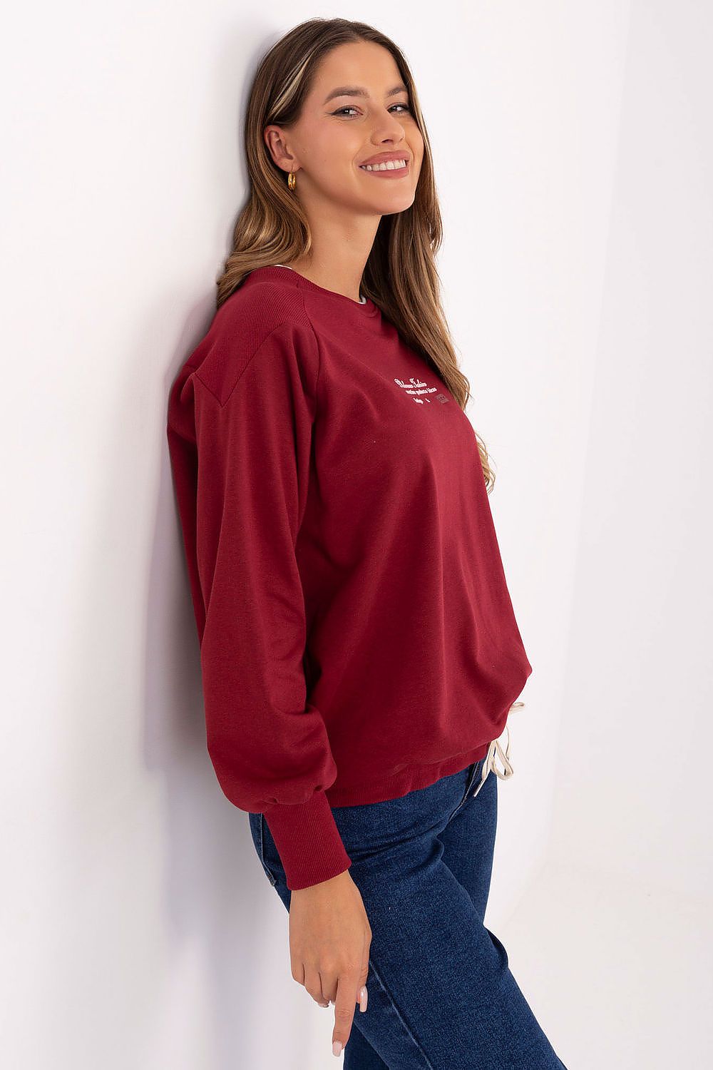 Luxury casual women's sweatshirt by Relevance in a soft cotton-polyester blend, featuring a trendy print and tying bottom for a chic silhouette.