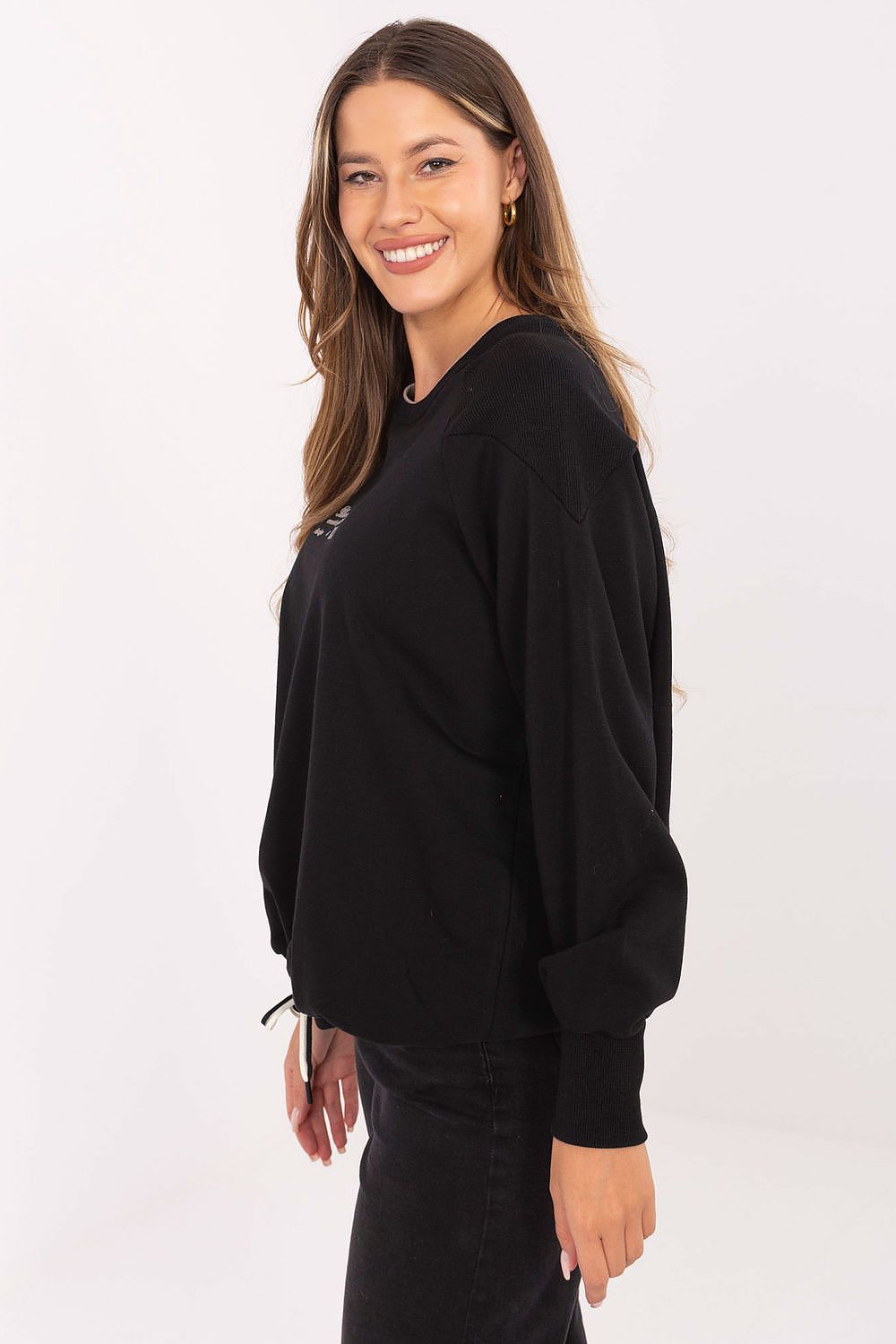 Close-up of the trendy print detail on Relevance's women's sweatshirt, emphasizing the luxurious blend of cotton and polyester for a sophisticated look.