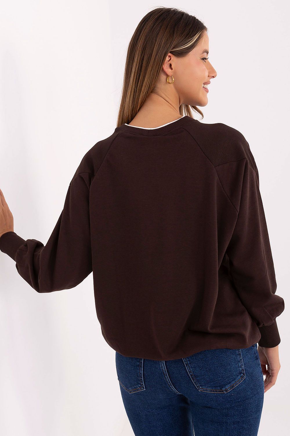 Sophisticated casual sweatshirt for women by Relevance, crafted from premium cotton and polyester, featuring a classic design with ribbed long sleeves and a fashionable tied hem.