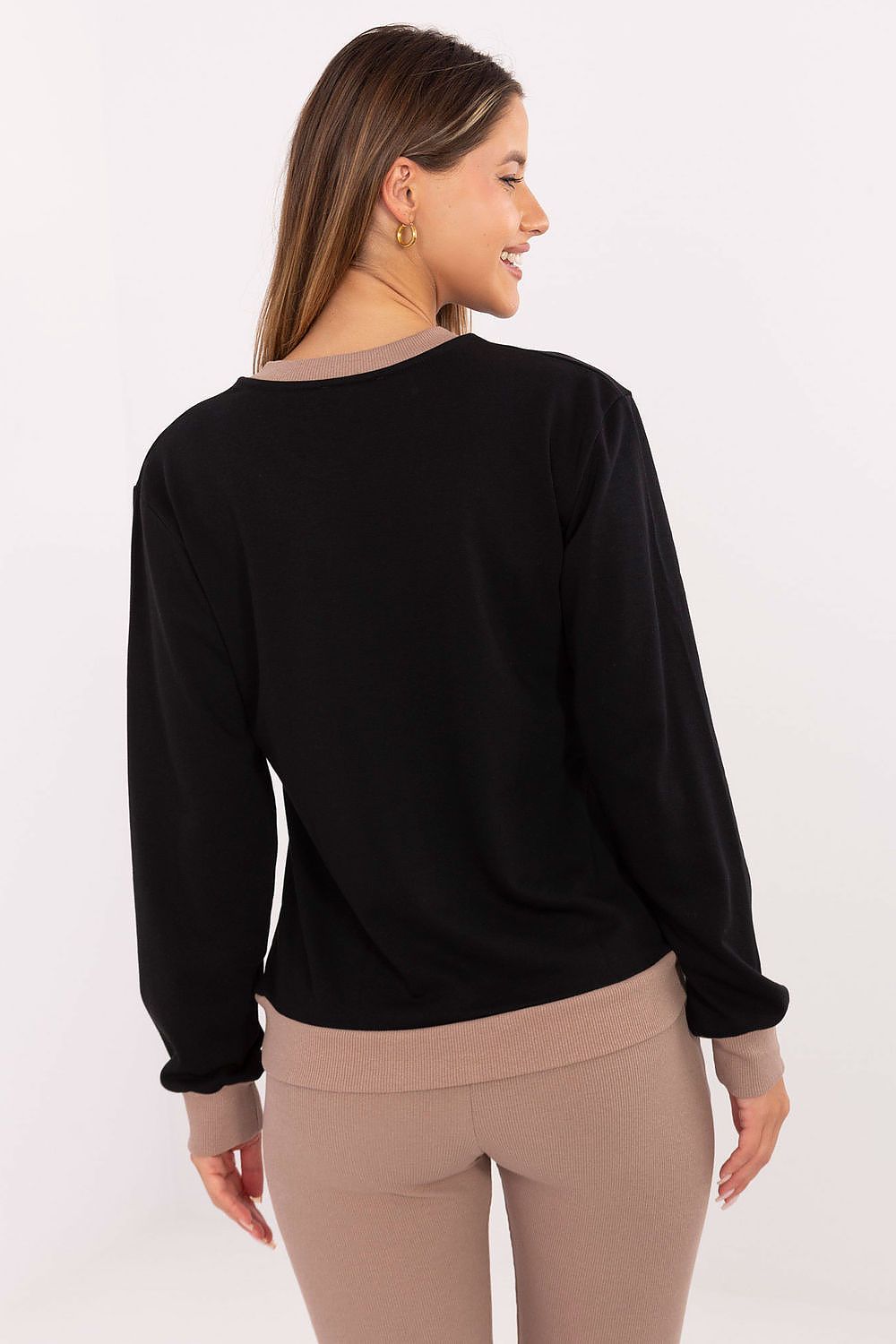 Elegant casual women's sweatshirt by Relevance featuring subtle embroidery and a stylish round neckline made from a soft cotton-polyester blend.