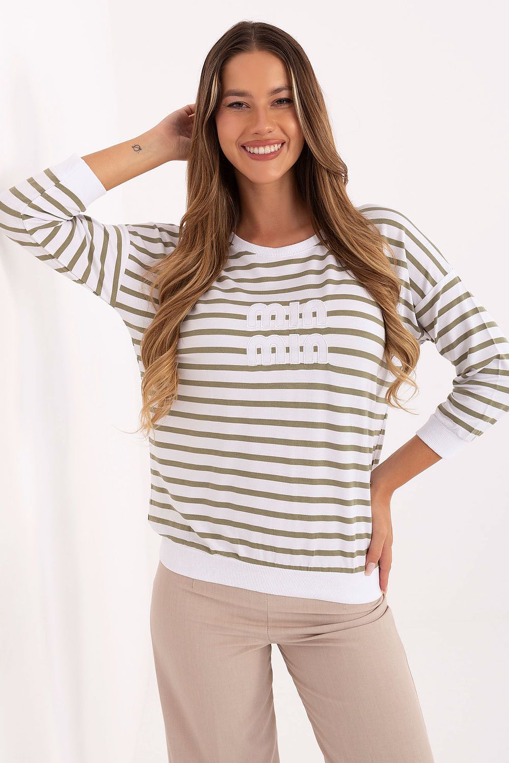 Luxury women's casual blouse in soft micromodal by Relevance, featuring elegant elbow-length sleeves and a chic striped pattern, designed for a perfect fit and comfort.